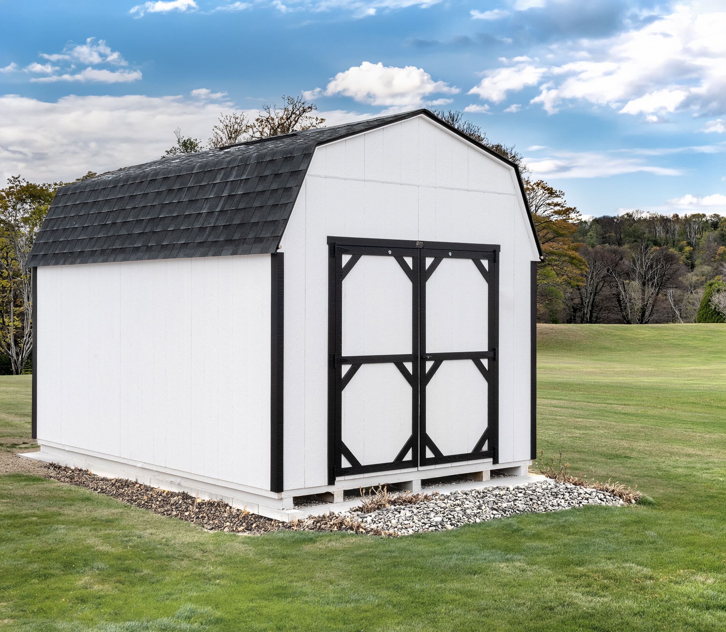 A 10x14 Mast Mini Barn 10ft Lofted Painted Pro shed shown with black architectural shingles, White with Black trim