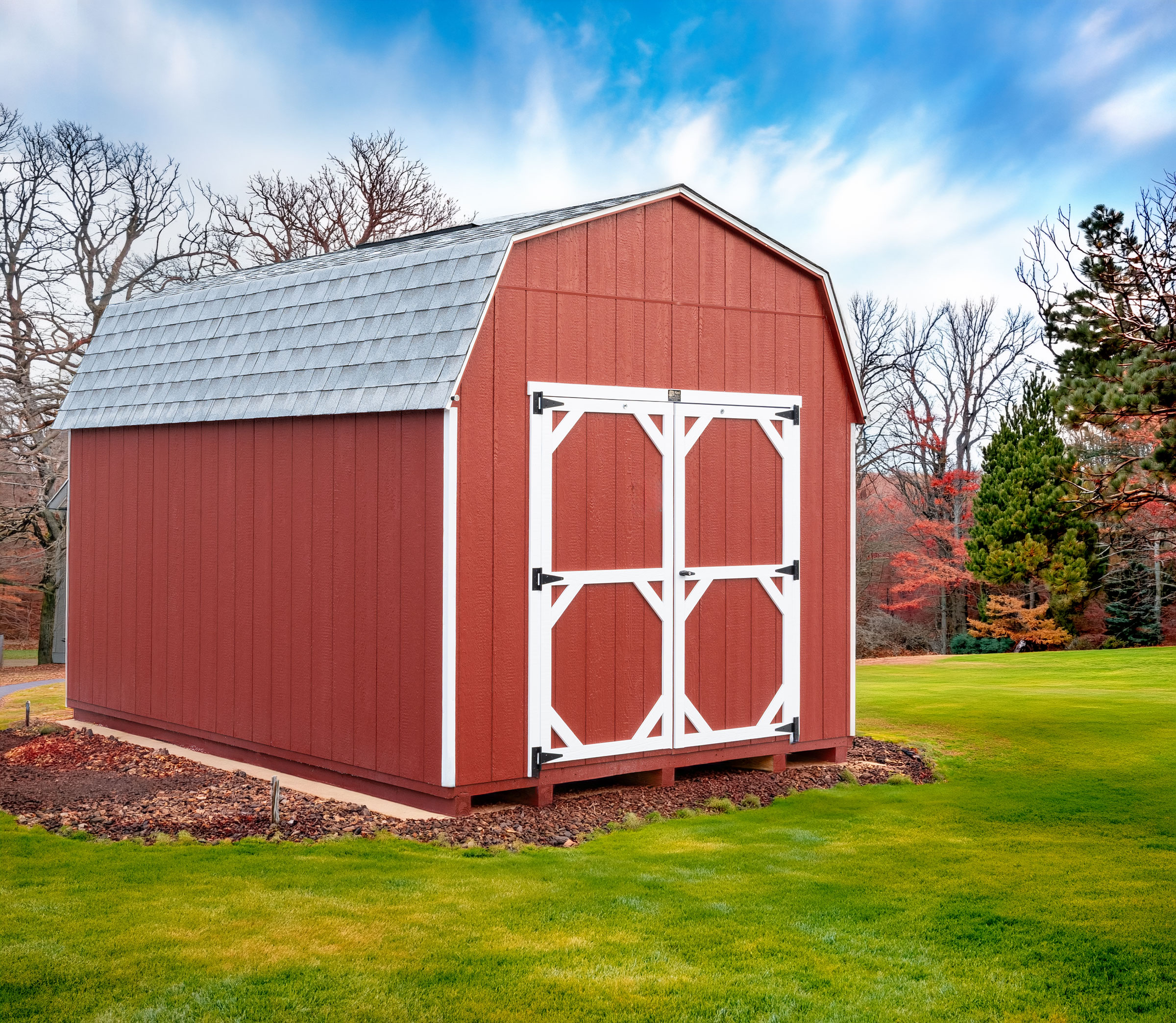 A 10x14 Mast Mini Barn 10ft Lofted Painted Pro shed shown with architectural shingles, Red with White trim