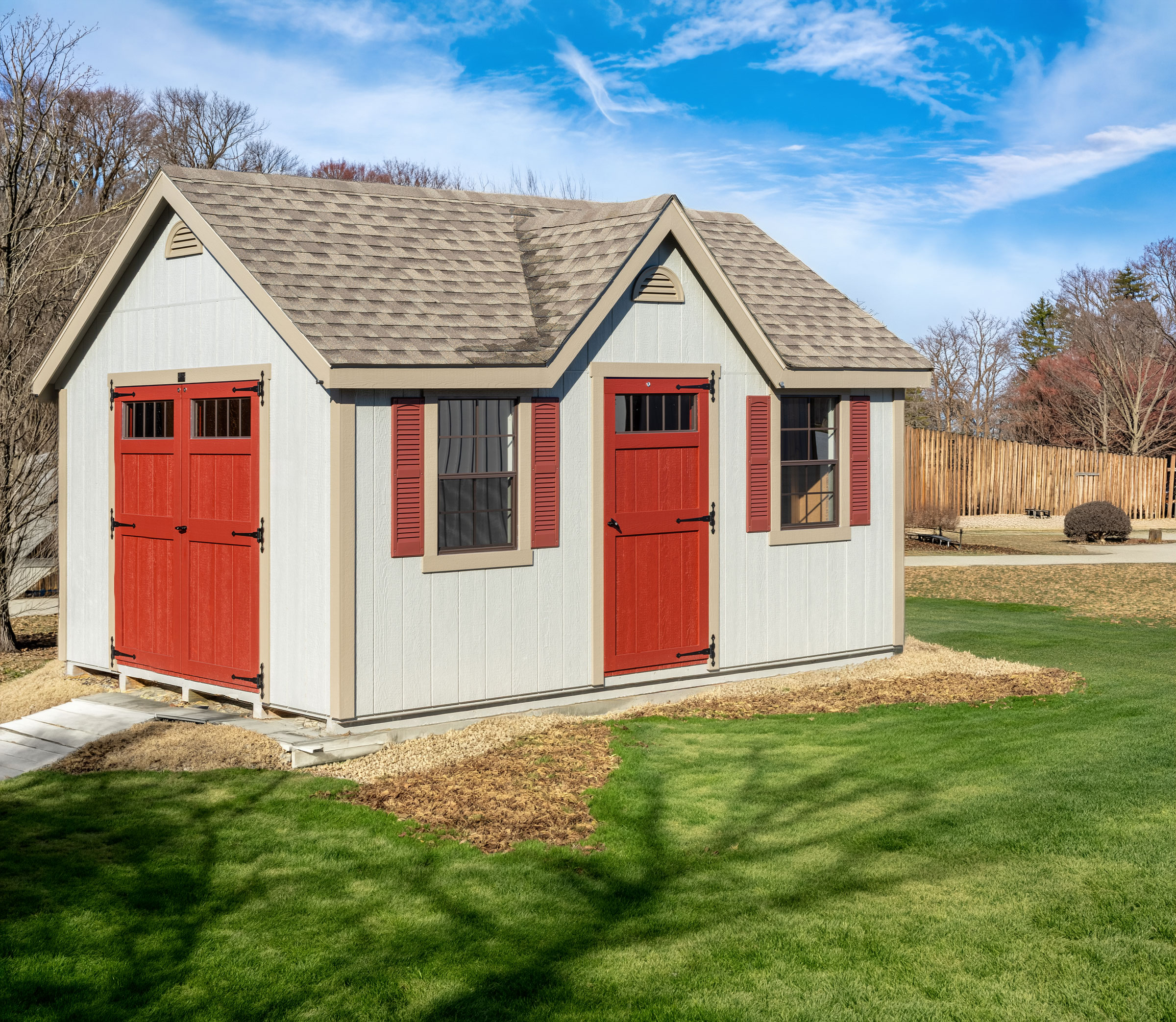 A Mast Mini Barn Chalet shown in Costal Sage with Clay trim